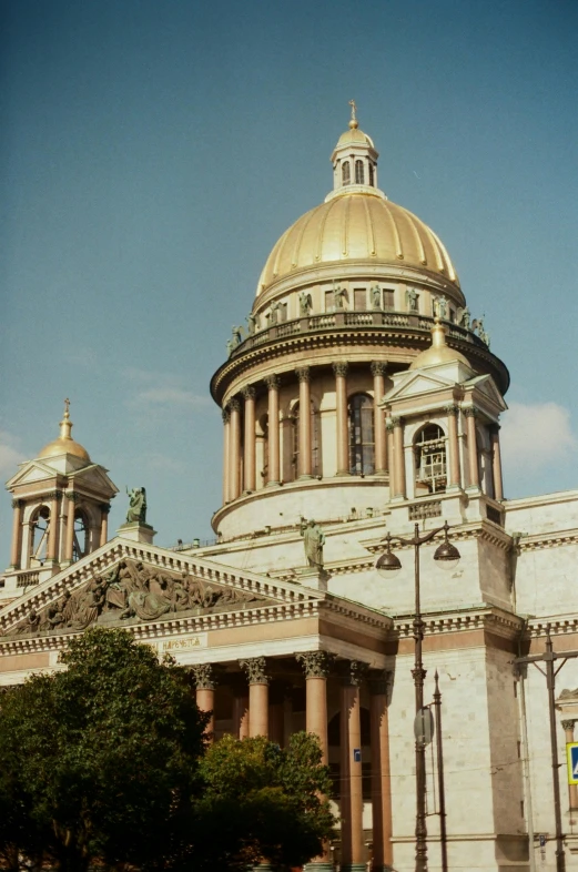 a large building with a dome at the top