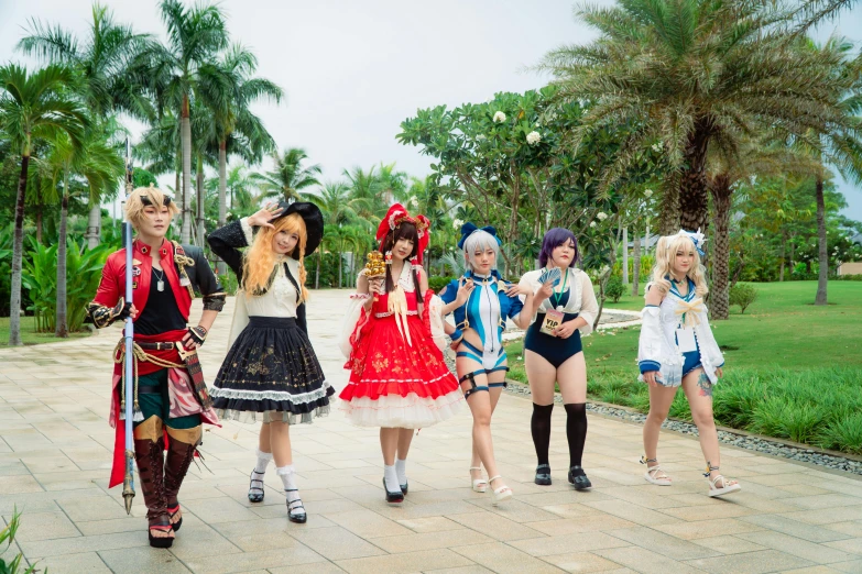 seven anime characters are walking on a path