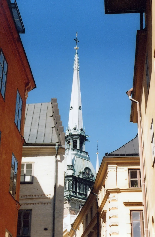 a tall building towering over the top of other buildings