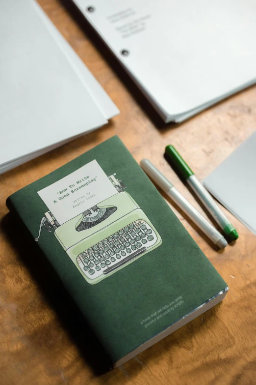 an old fashioned typewriter surrounded by stationery