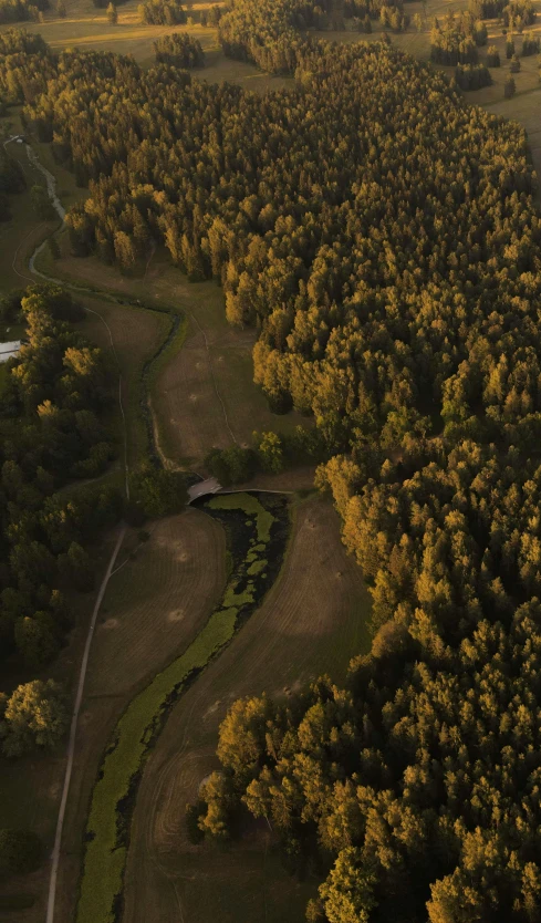 an aerial po of the countryside near a road