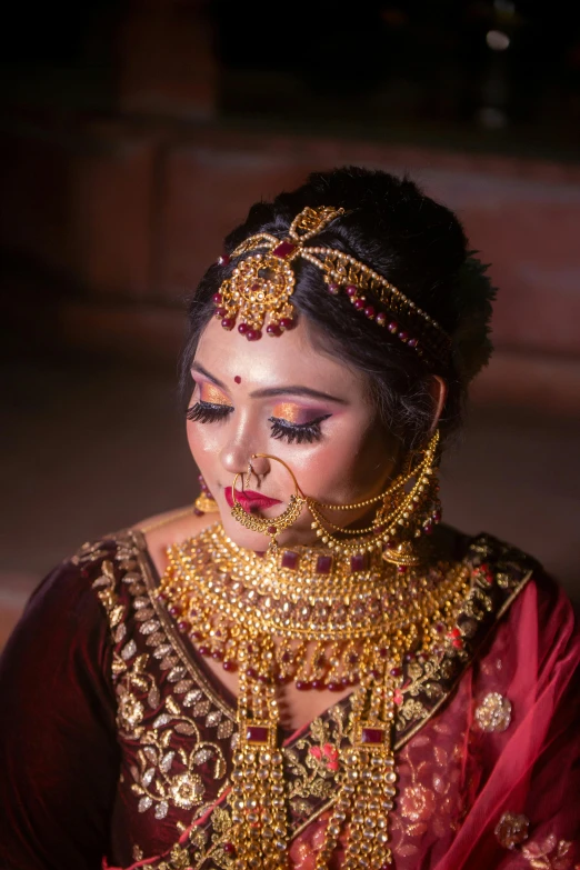 the bridal is wearing an ornate necklace