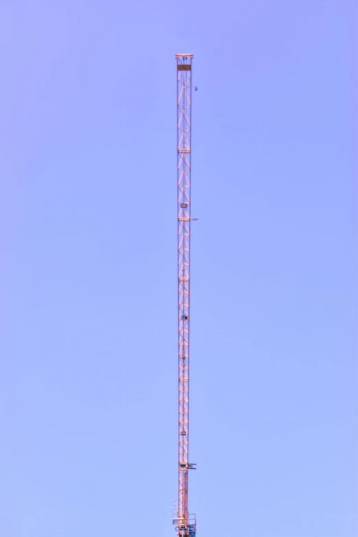 this tower has several cell towers around it