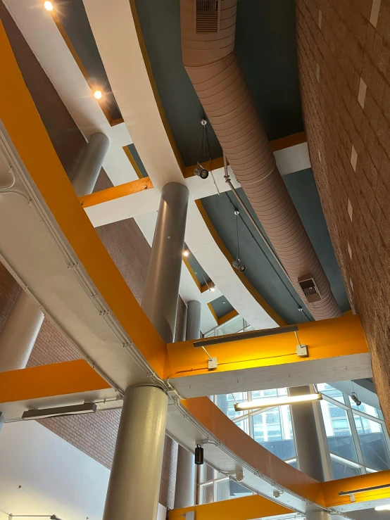 the interior of a building with multiple large poles