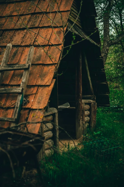 an old house made of wooden planks and logs