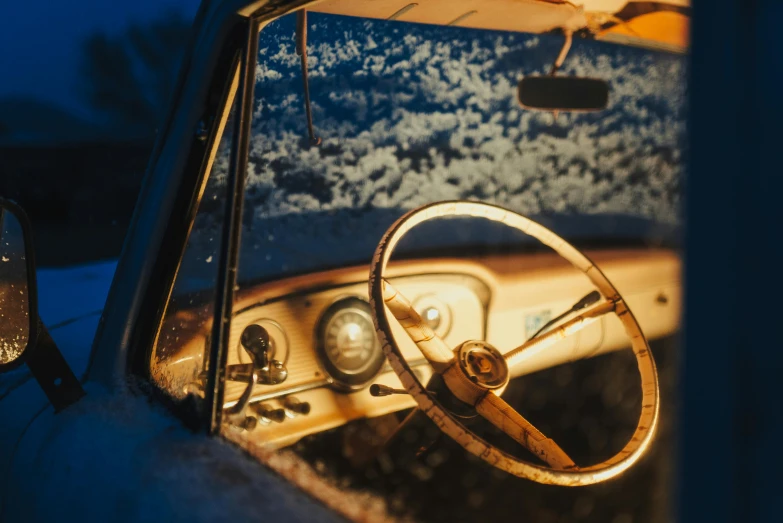 the interior of an old vehicle in the snow