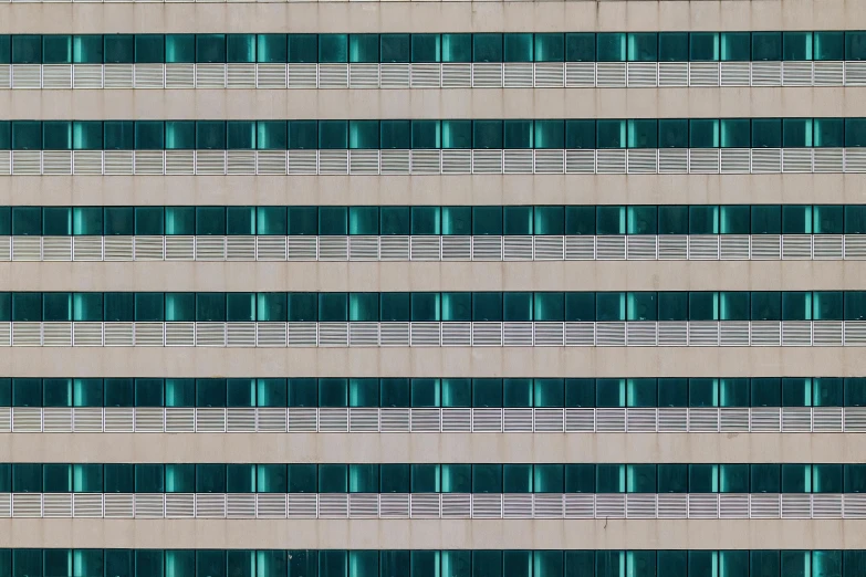 a close up of a wall that has multiple windows