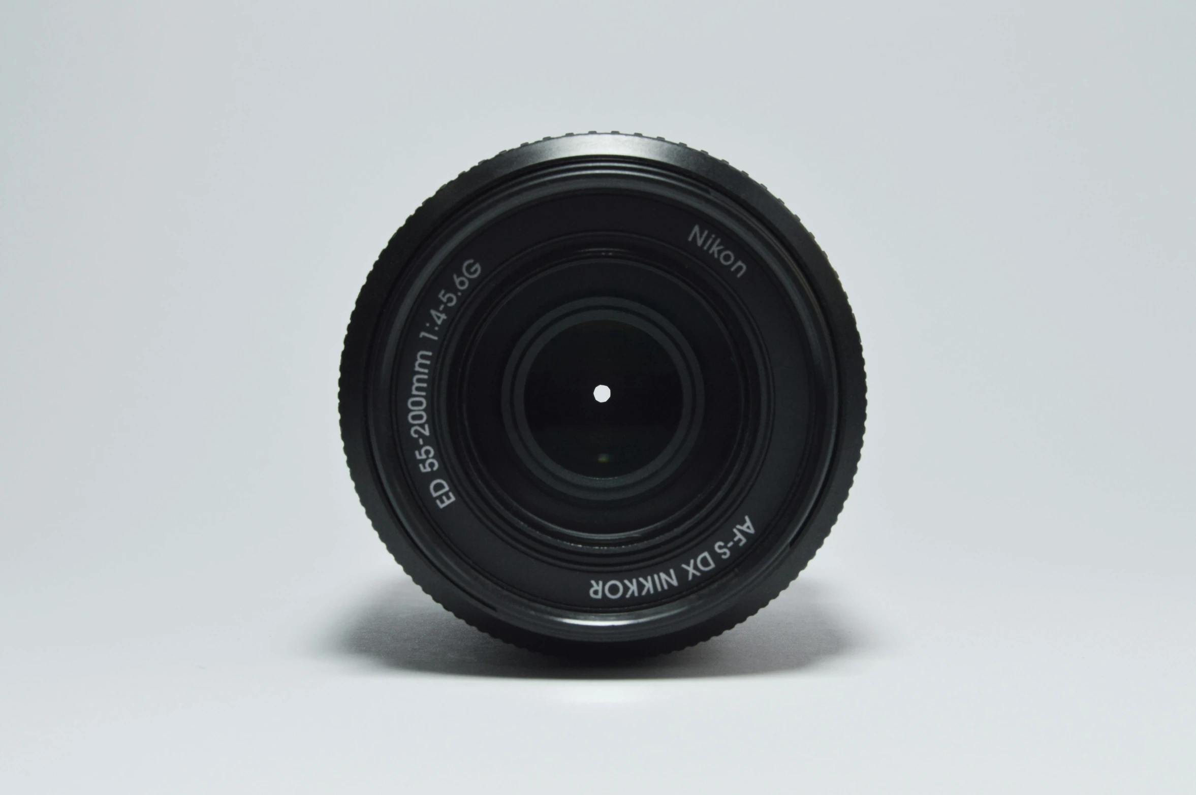 a lens used for many cameras mounted on a white background