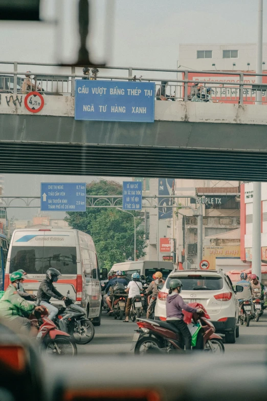 there are many motorcycles that are driving in this street