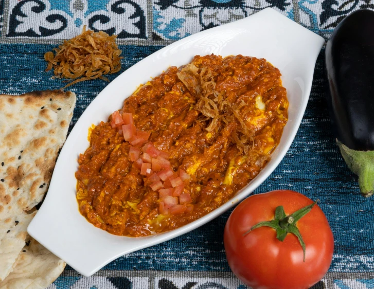 there are some beans and a fork next to a plate