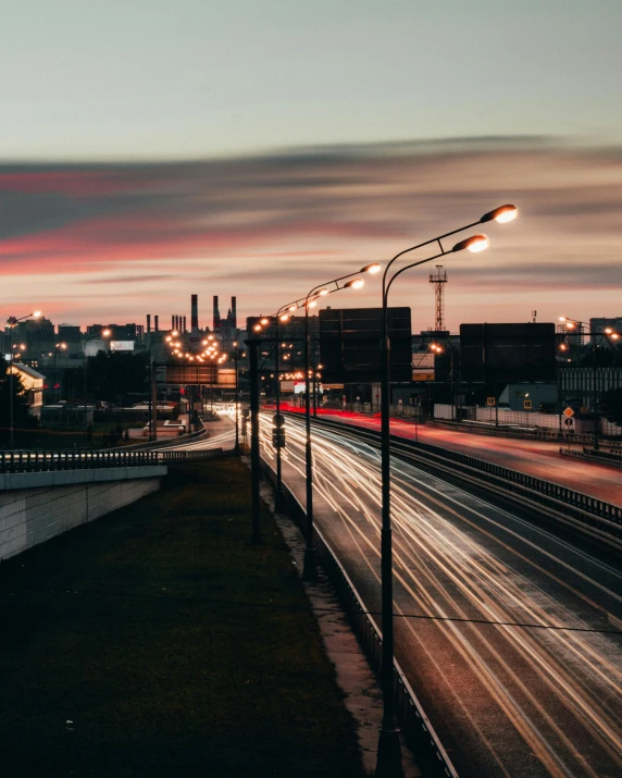 a dark sky with a street light in the foreground