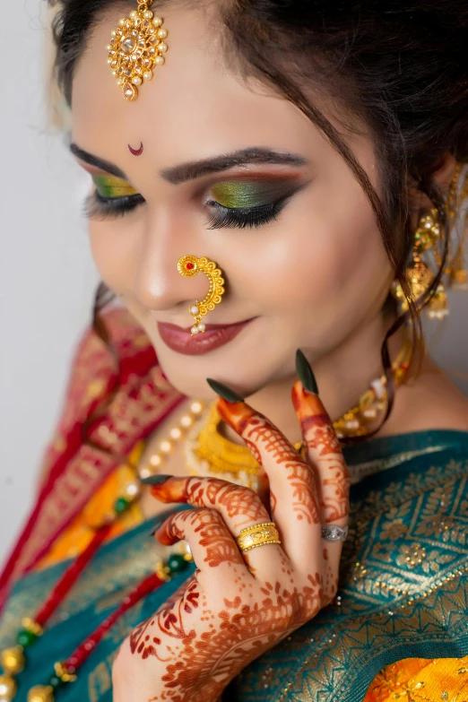 a bride in her traditional indian wedding outfit
