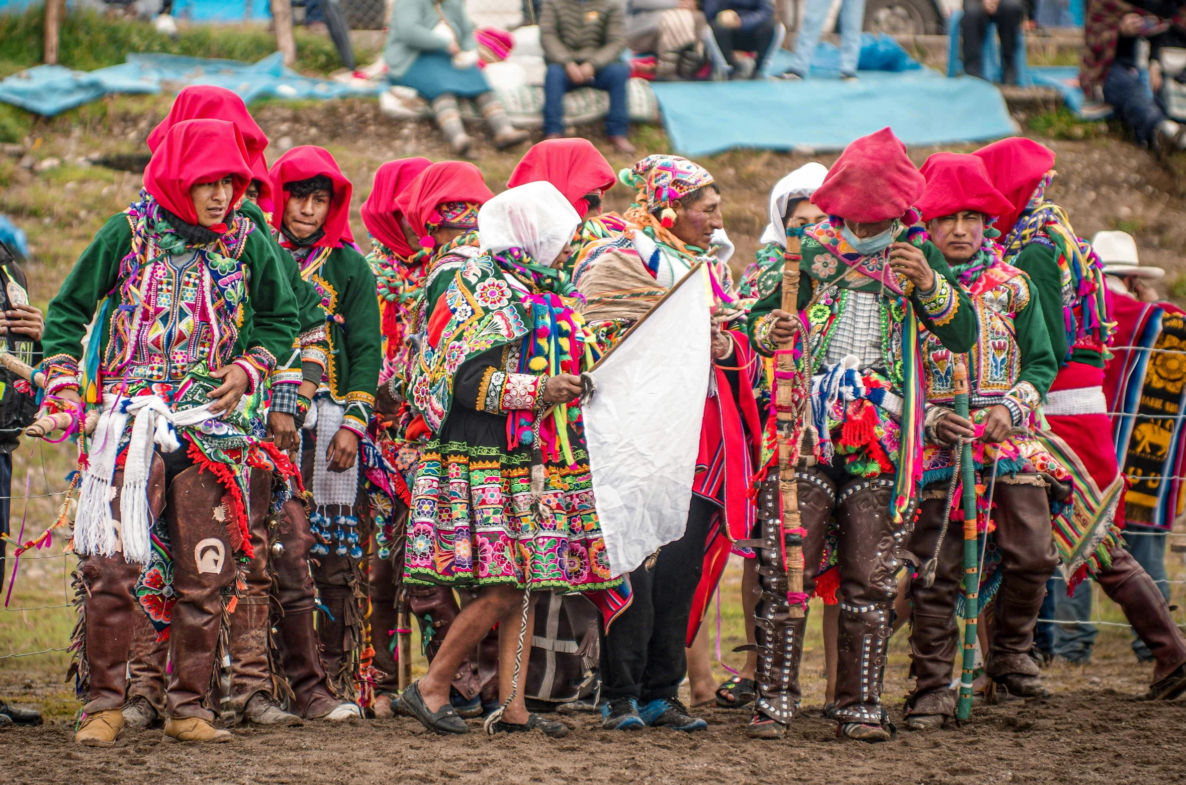 several people in costume standing in a circle with one man standing in the front