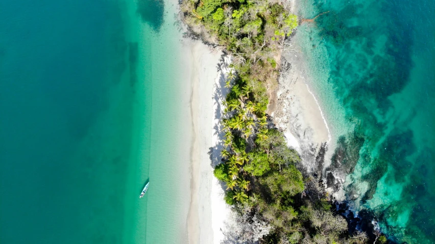 an aerial view of a small island on the ocean