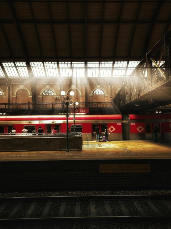 a train pulls into the depot at night