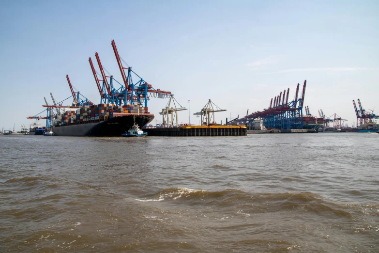 a group of boats are parked at the dock