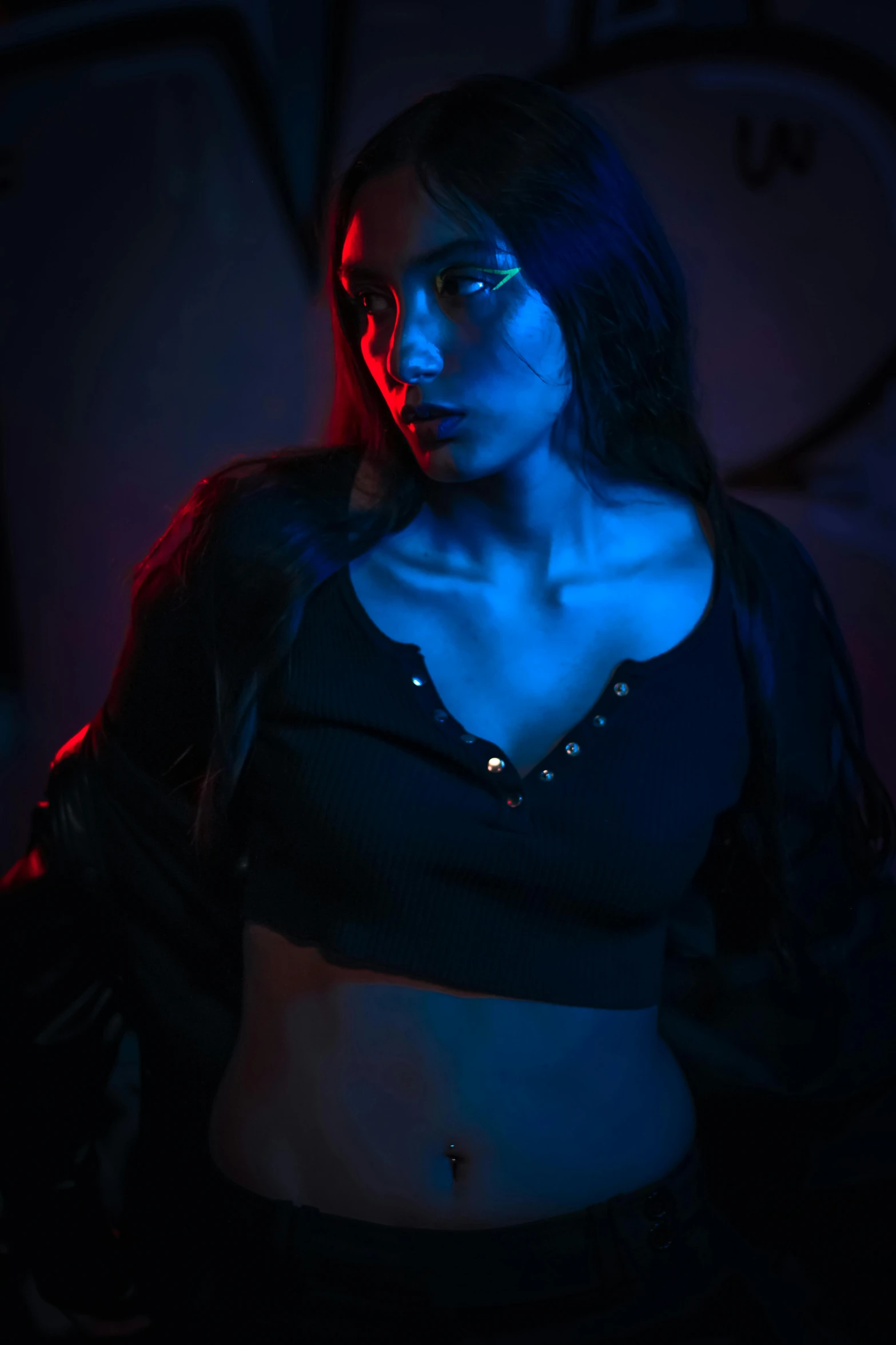 an image of a woman with blue lights on her chest