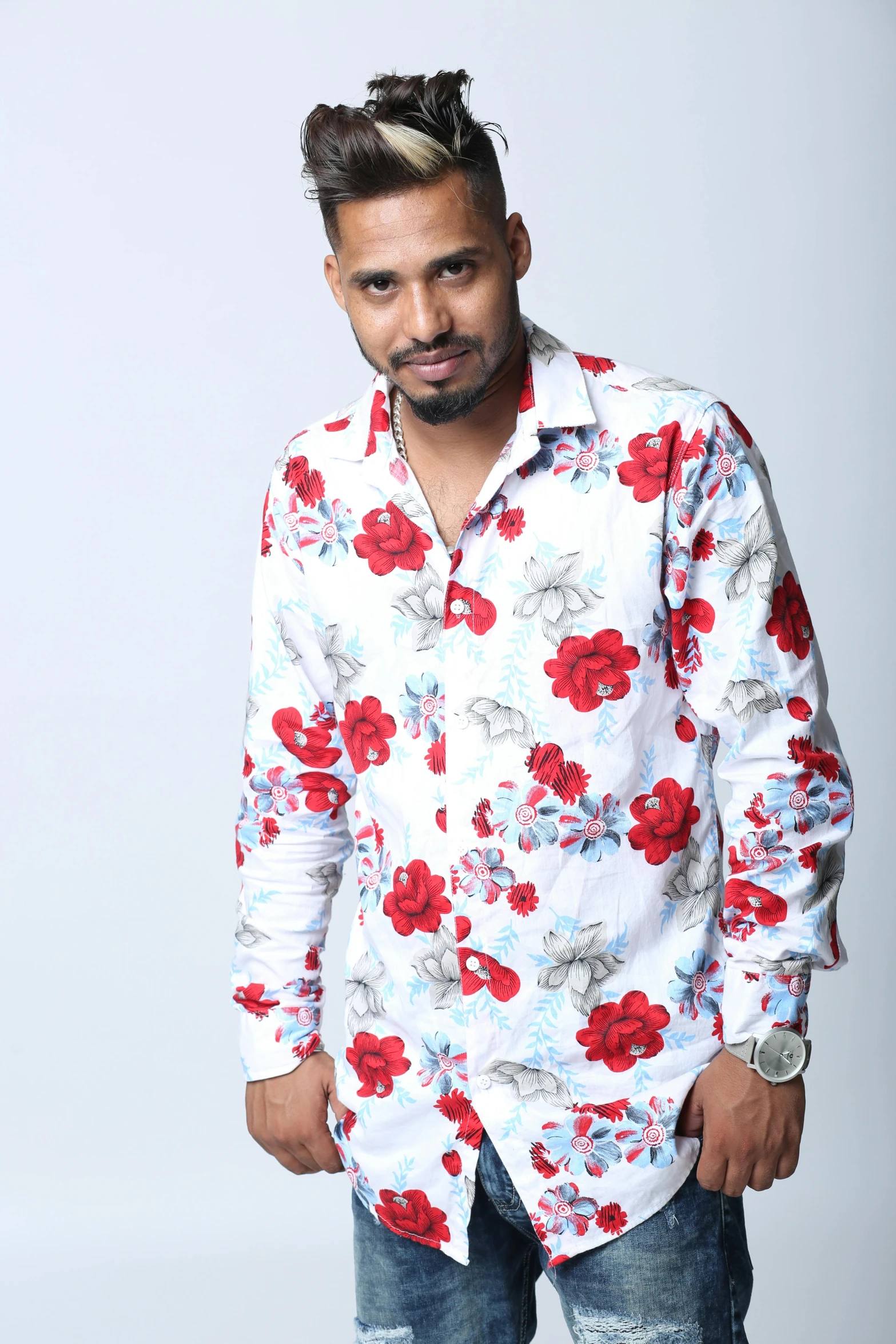 an image of a man wearing floral shirt