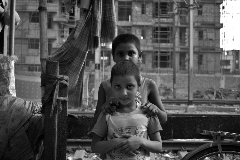black and white image of two young children