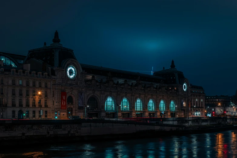 a large building at night with lots of windows