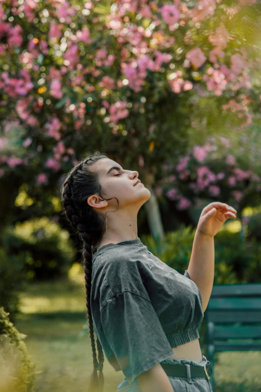 a woman that is holding up soing in her hands