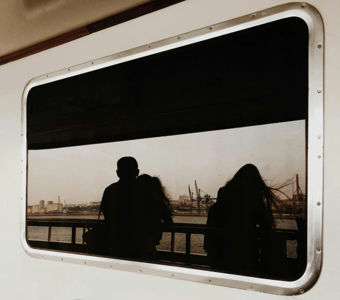 a couple of people standing on a platform