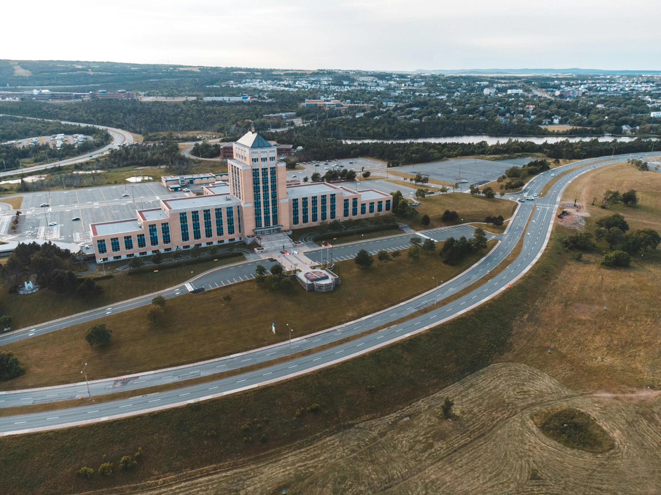 a large building that is on the side of a road