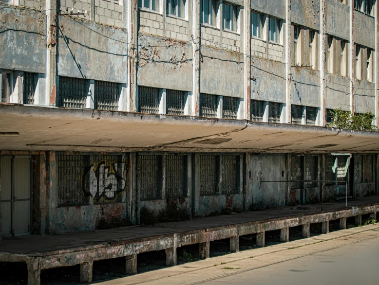 an old building has graffiti on the walls