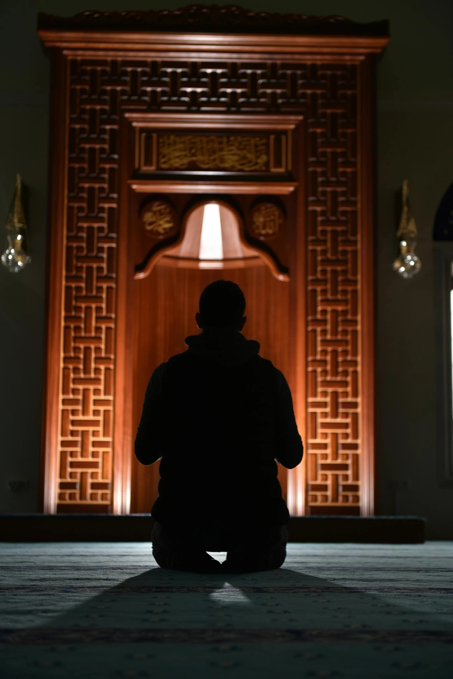 a person sitting in front of an entrance