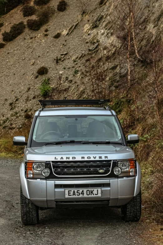 the four wheel drive is parked at the top of the hill