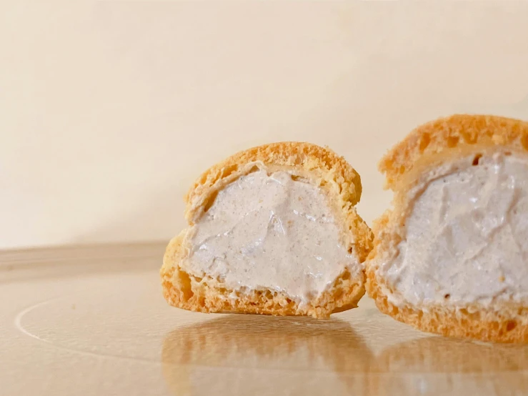 there are several pieces of bread that have been frosted and are on the table