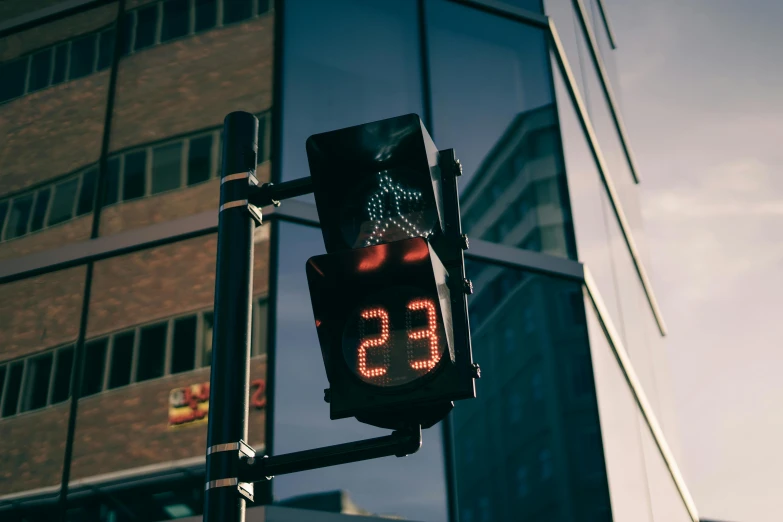 a traffic signal with the word 55 lit up