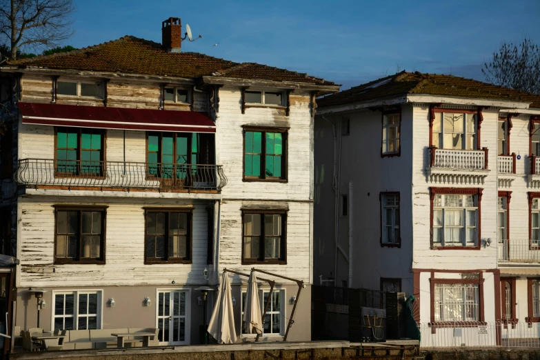 two buildings next to each other on a street