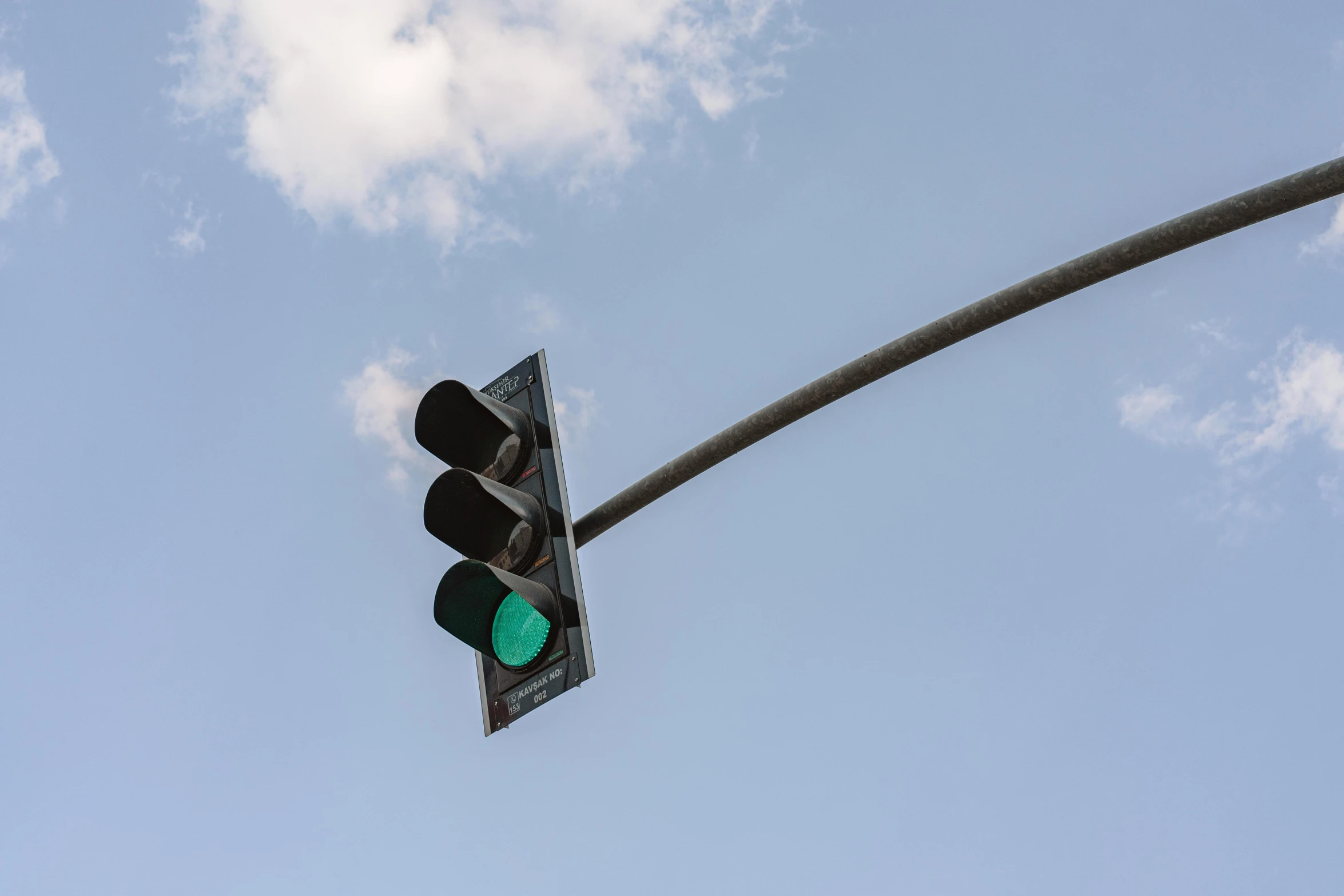 traffic lights and pole against the sky