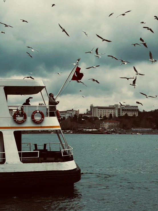 a large boat floating on top of a lake