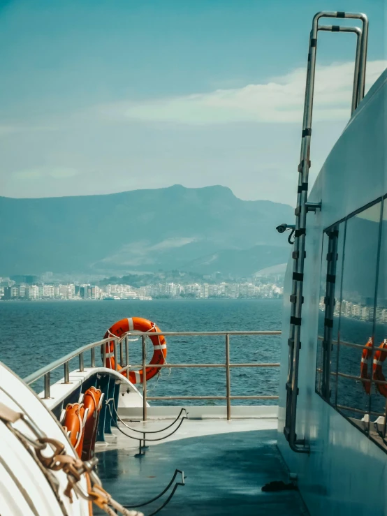 the view from a ship's deck over the water