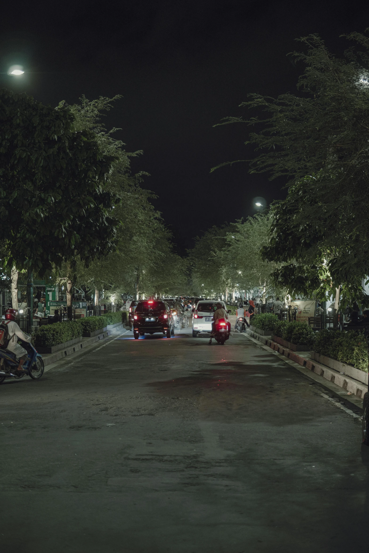 the view from a street light in a residential neighborhood