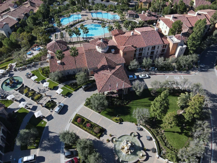 a big house is surrounded by many trees