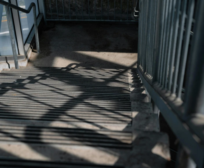 the metal stairs are next to a building