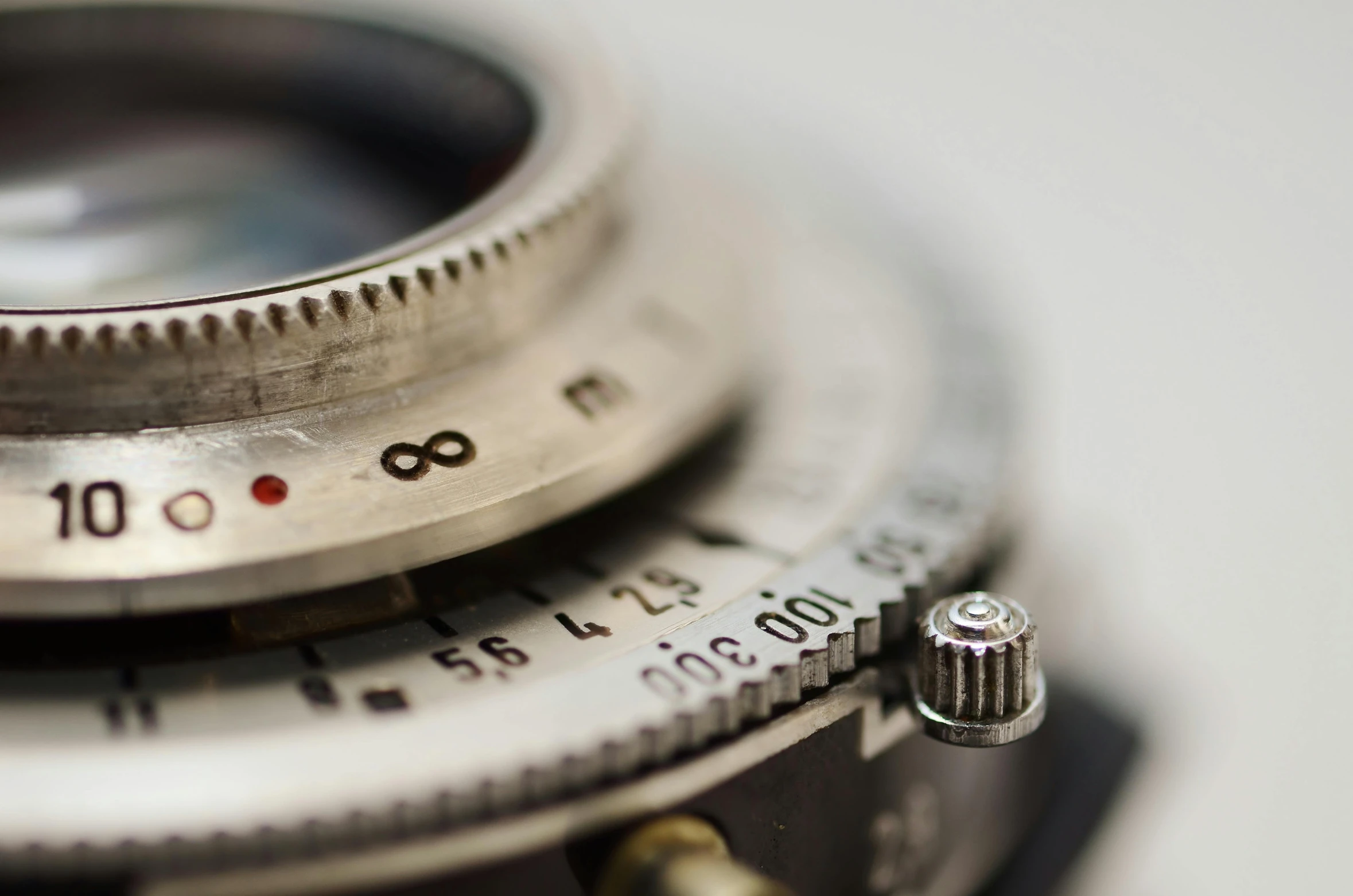 a closeup of two metal camera parts