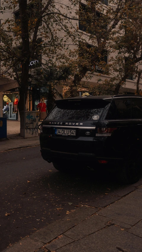 the back end of a vehicle parked on the street