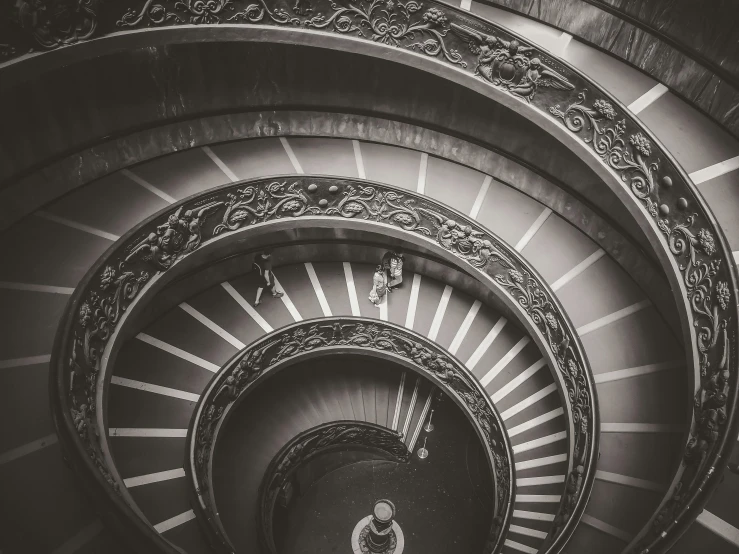 a black and white po of a spiral staircase