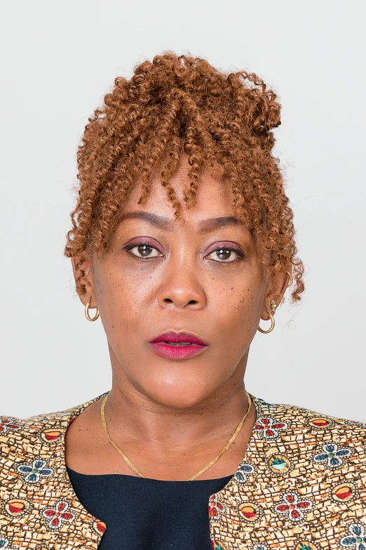 a close up image of a woman with brown hair