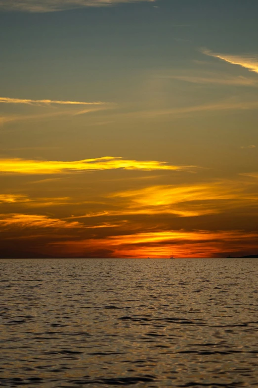 this is a po of the sunset from a boat