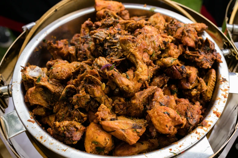 a large bowl of stew sits on the table