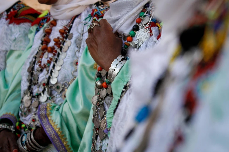 an ethnic woman in colorful head wear