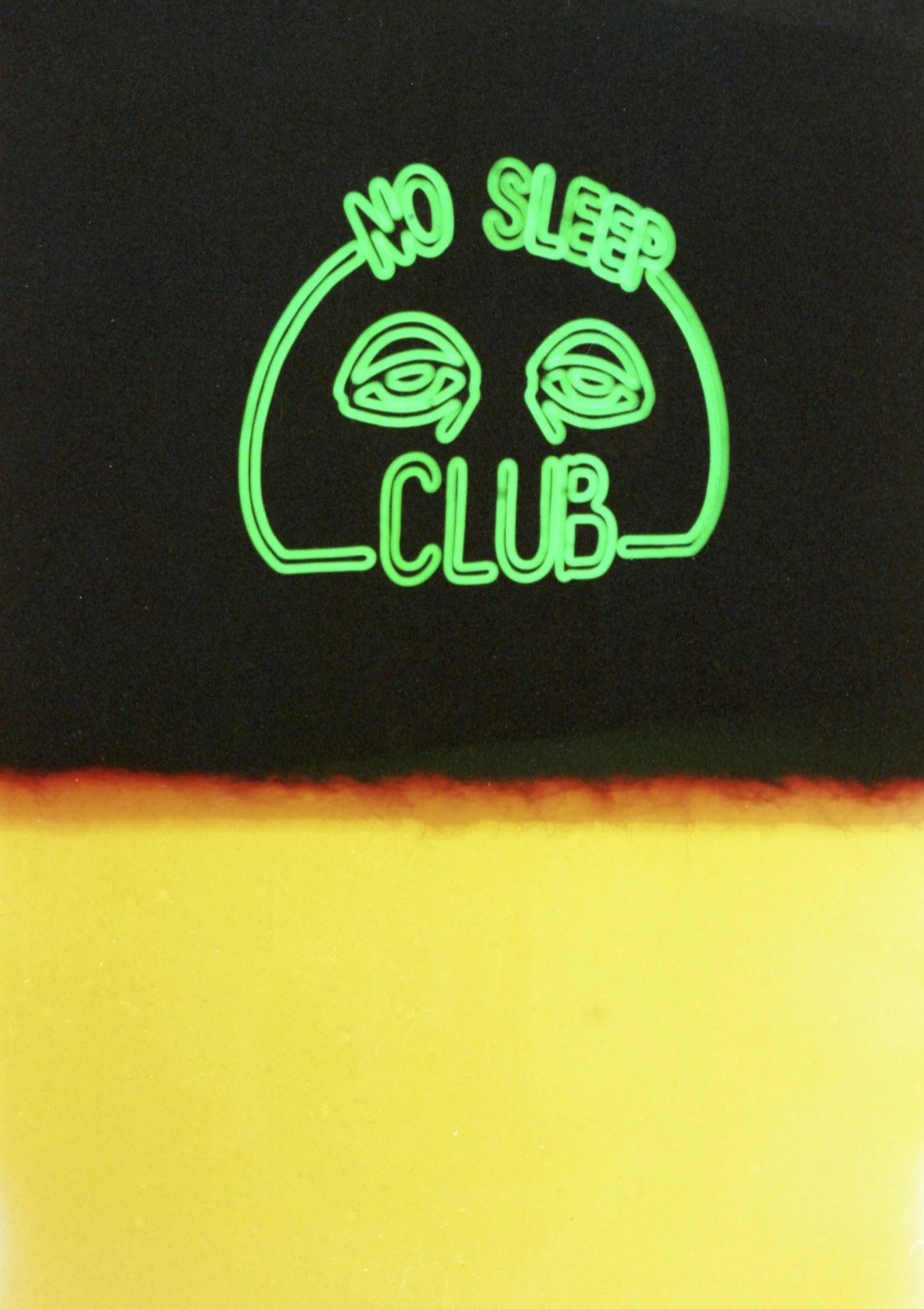 neon stickers on the back of a skateboard that says no sleep club