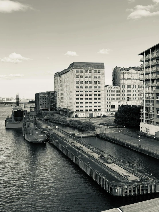 a boat in the water near a city