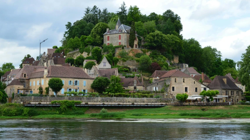 this old, stone village sits on the edge of a river