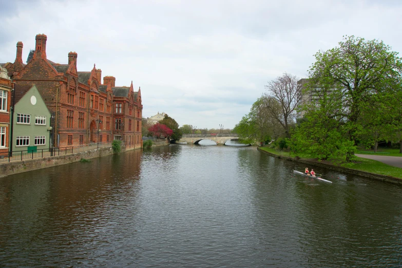 a small canal with houses on the sides of it